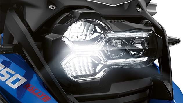 We see the front headlight of the R 1250 GS Adventure.